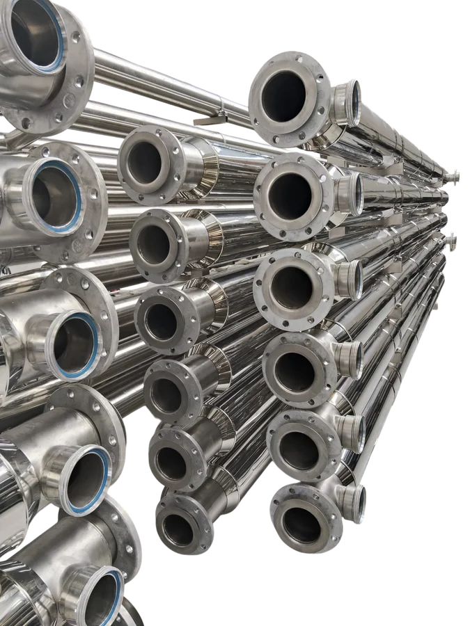 Batch of tube-in-tube exchangers with flanged connections, ready for dispatch